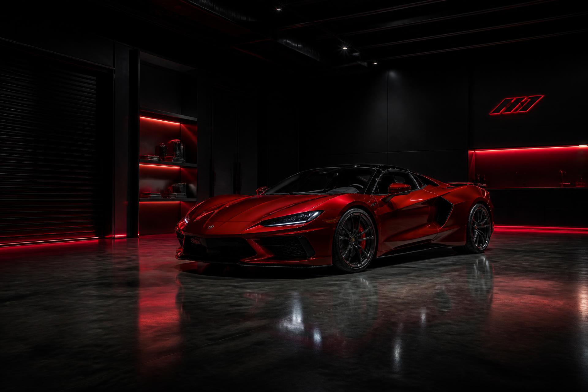 Red supercar parked in a dark luxury private garage